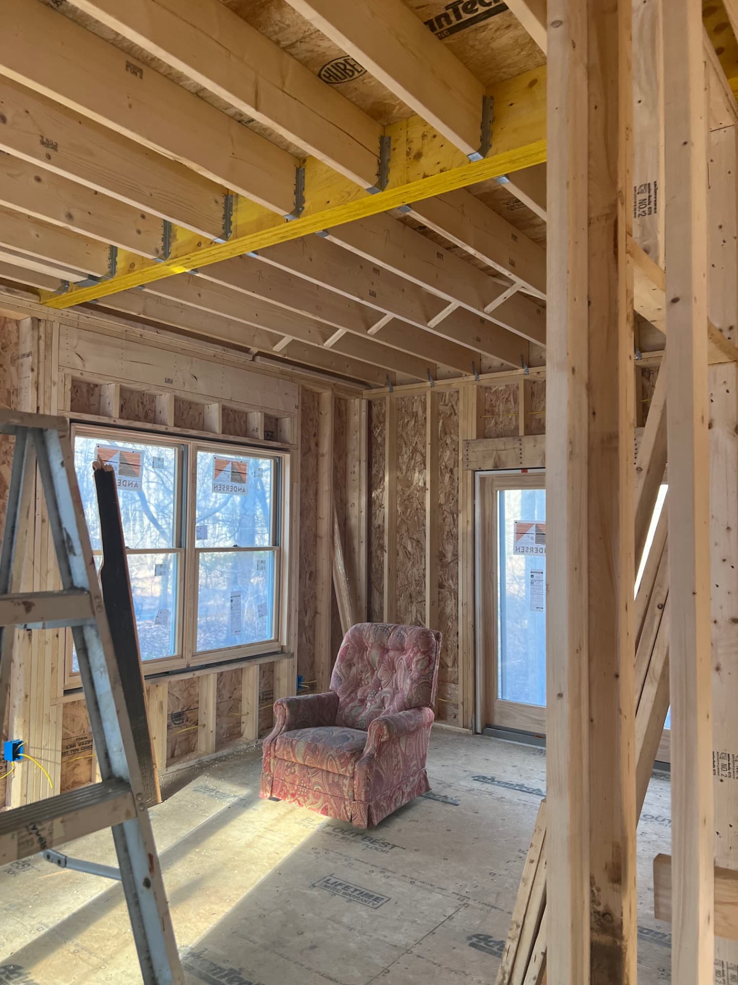 Interior renovation during timber framing and window installation